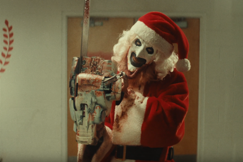 Terrifier 3 Official image. Art the Clown takes a chainsaw to Christmas.